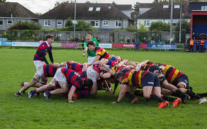 Clontarf scrum-half Sam Owens urging on his pack during a powerful scrum against Lansdowne at Castle Avenue.