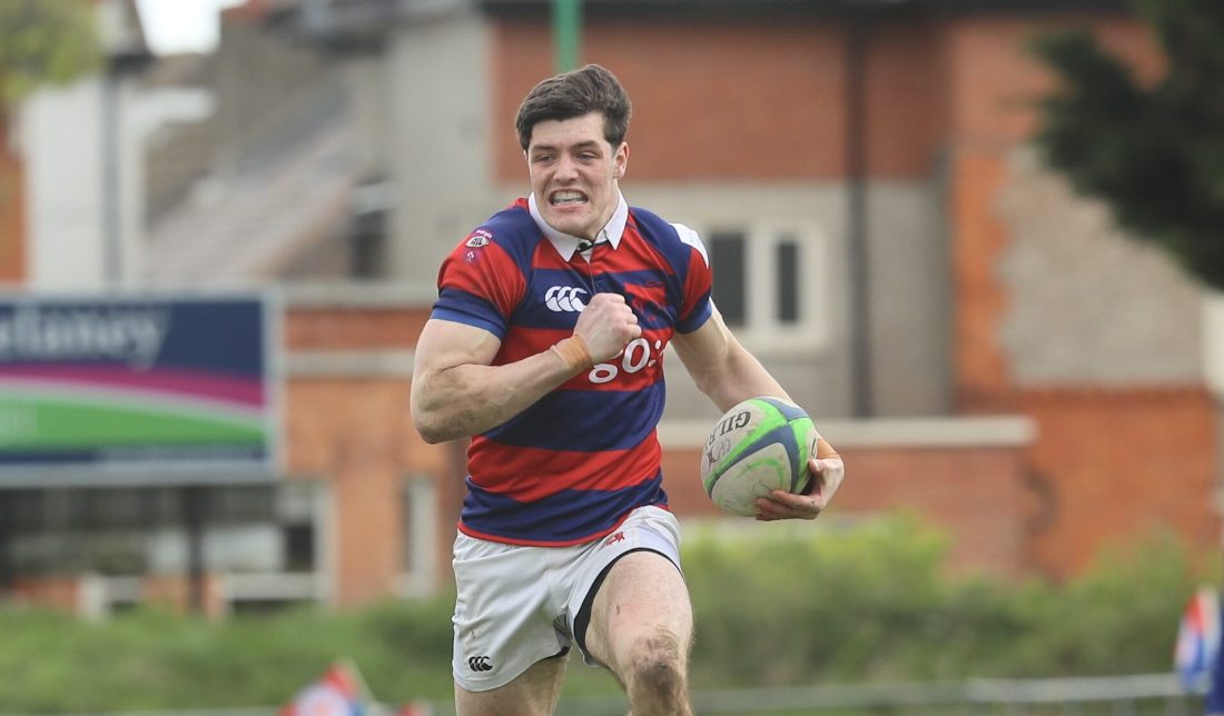 Dan Magner races over in the corner to score his first AIL try on debut for Clontarf against St Mary’s at Castle Avenue. Photo: Gareth Carville / Emerald Visions
