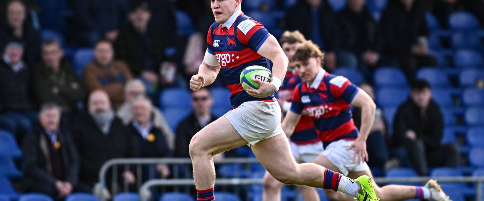 28 February 2026; Connor Fahy of Clontarf on his way to scoring his side's first try during the Energia All-Ireland League Men's Division 1A match between UCD RFC and Clontarf FC at Belfield Bowl in Dublin. Photo by Seb Daly/Sportsfile