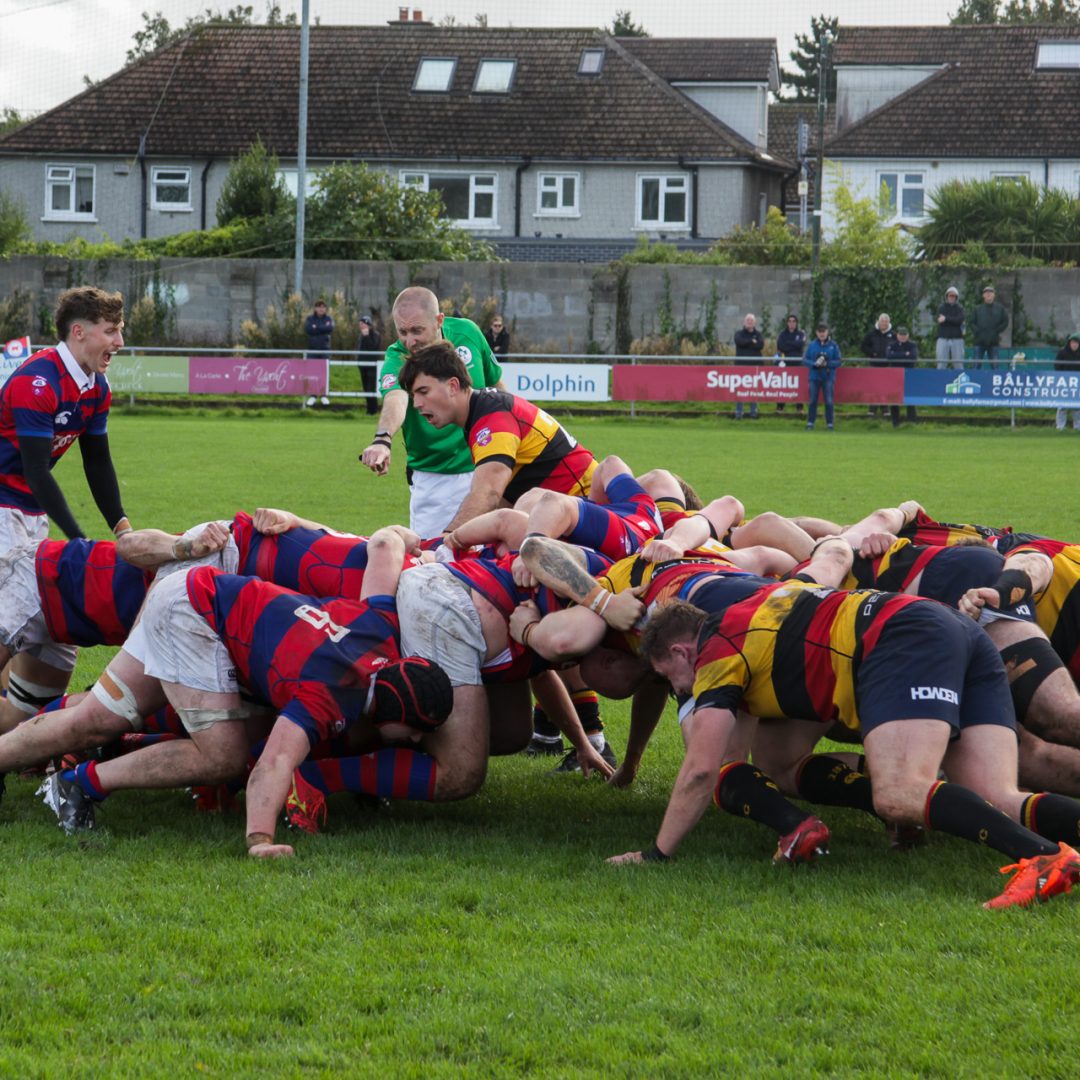 Clontarf scrum-half Sam Owens urging on his pack during a powerful scrum against Lansdowne at Castle Avenue.