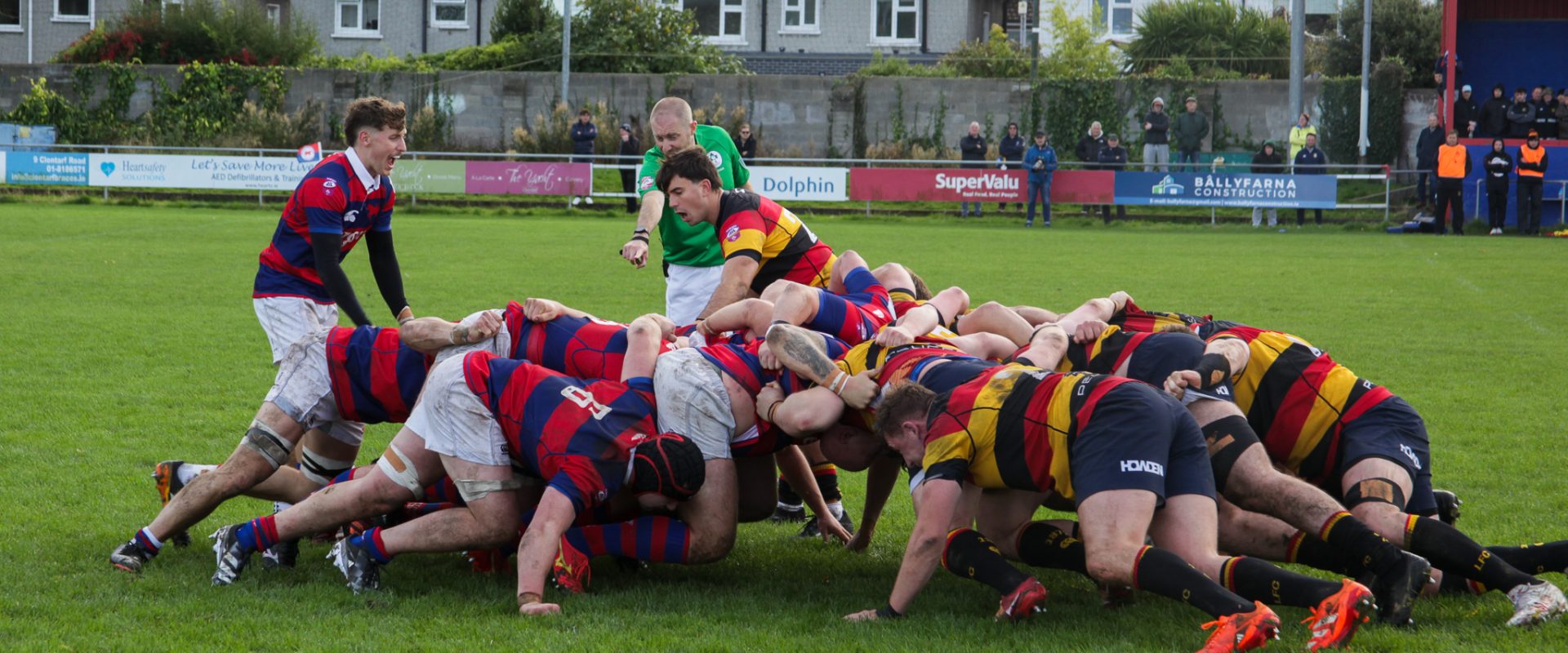 Clontarf scrum-half Sam Owens urging on his pack during a powerful scrum against Lansdowne at Castle Avenue.